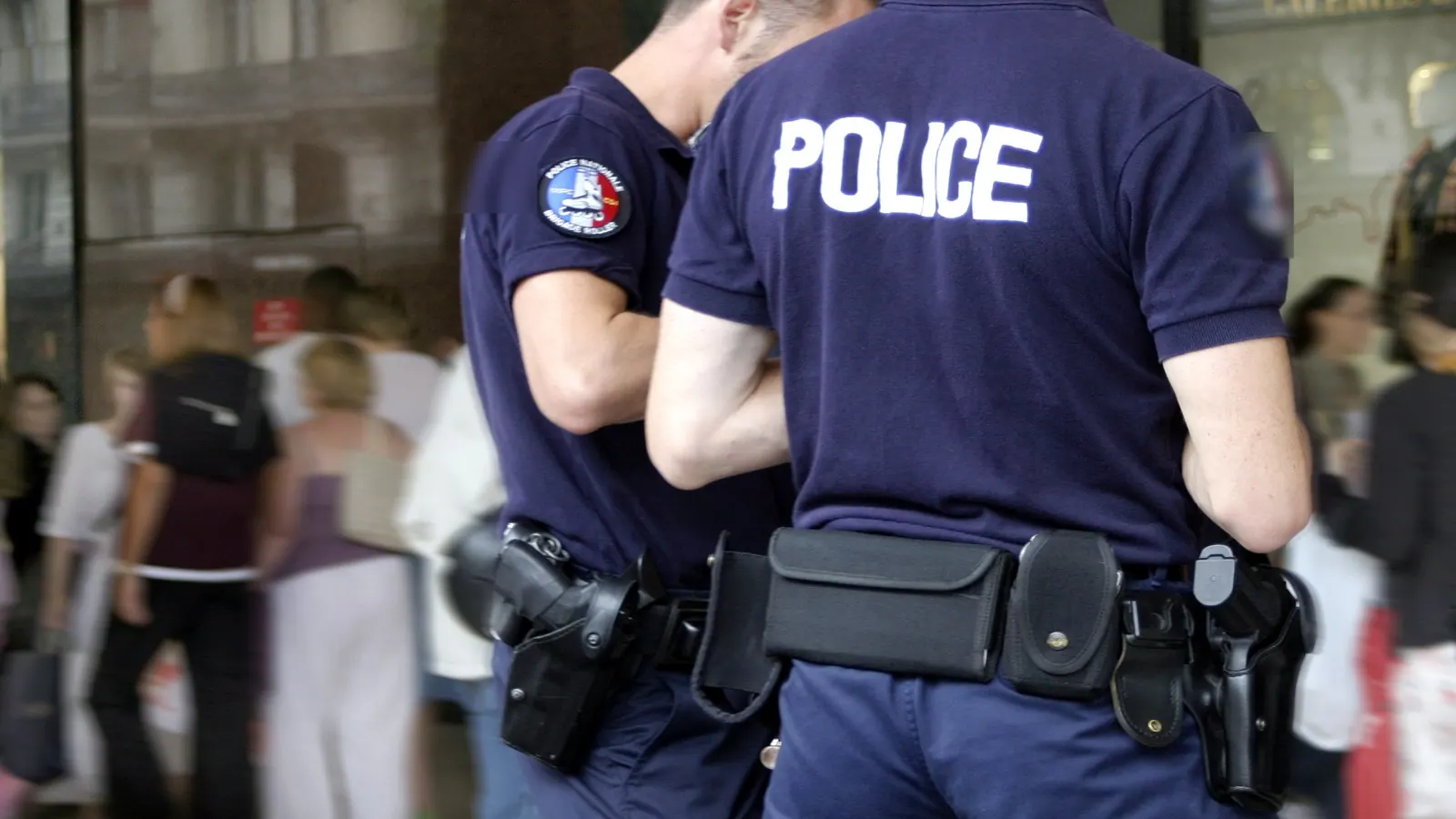 Police officers on patrol — duty equipment