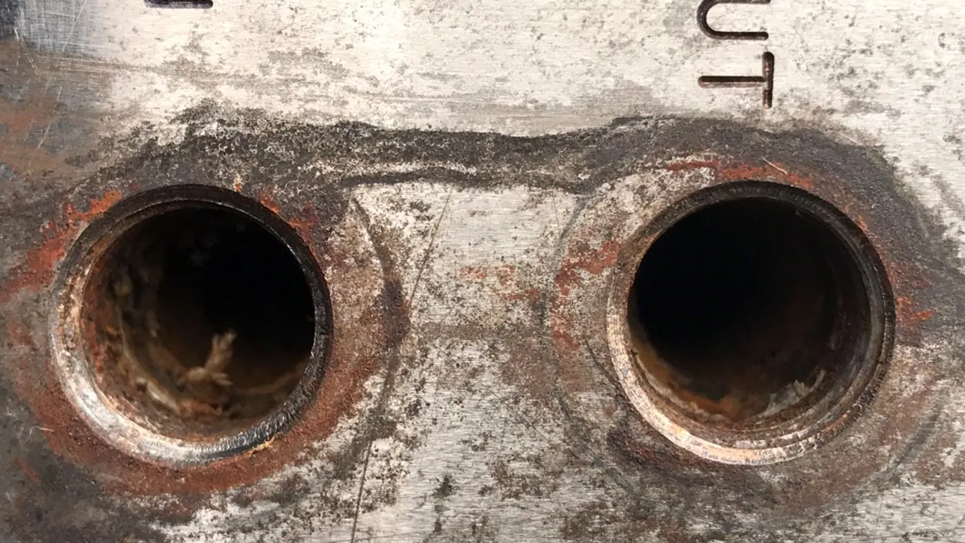 Corroded and scaled mould cooling ports before cleaning