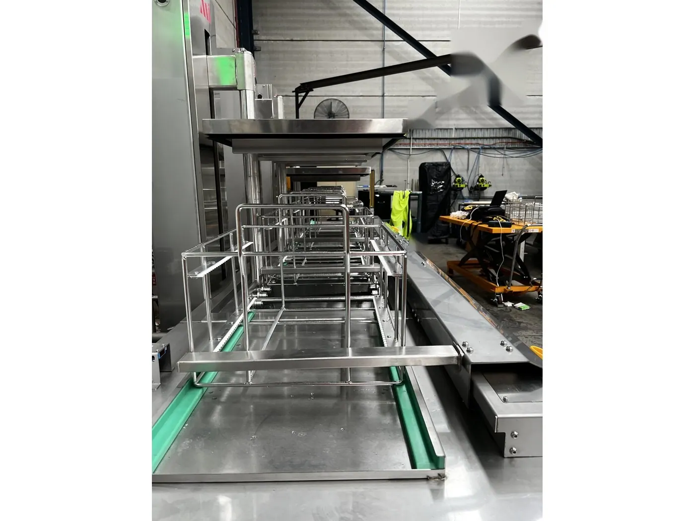 Baskets held above the tanks on the powered lifts