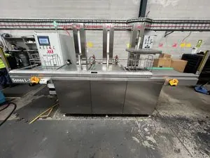 Misonics SonoLine automated ultrasonic cleaning line — Three stations, lift columns raised