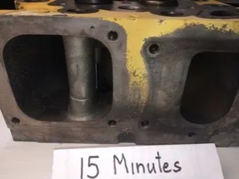 Cat 3516 cylinder head ports before and after ultrasonic cleaning — as received