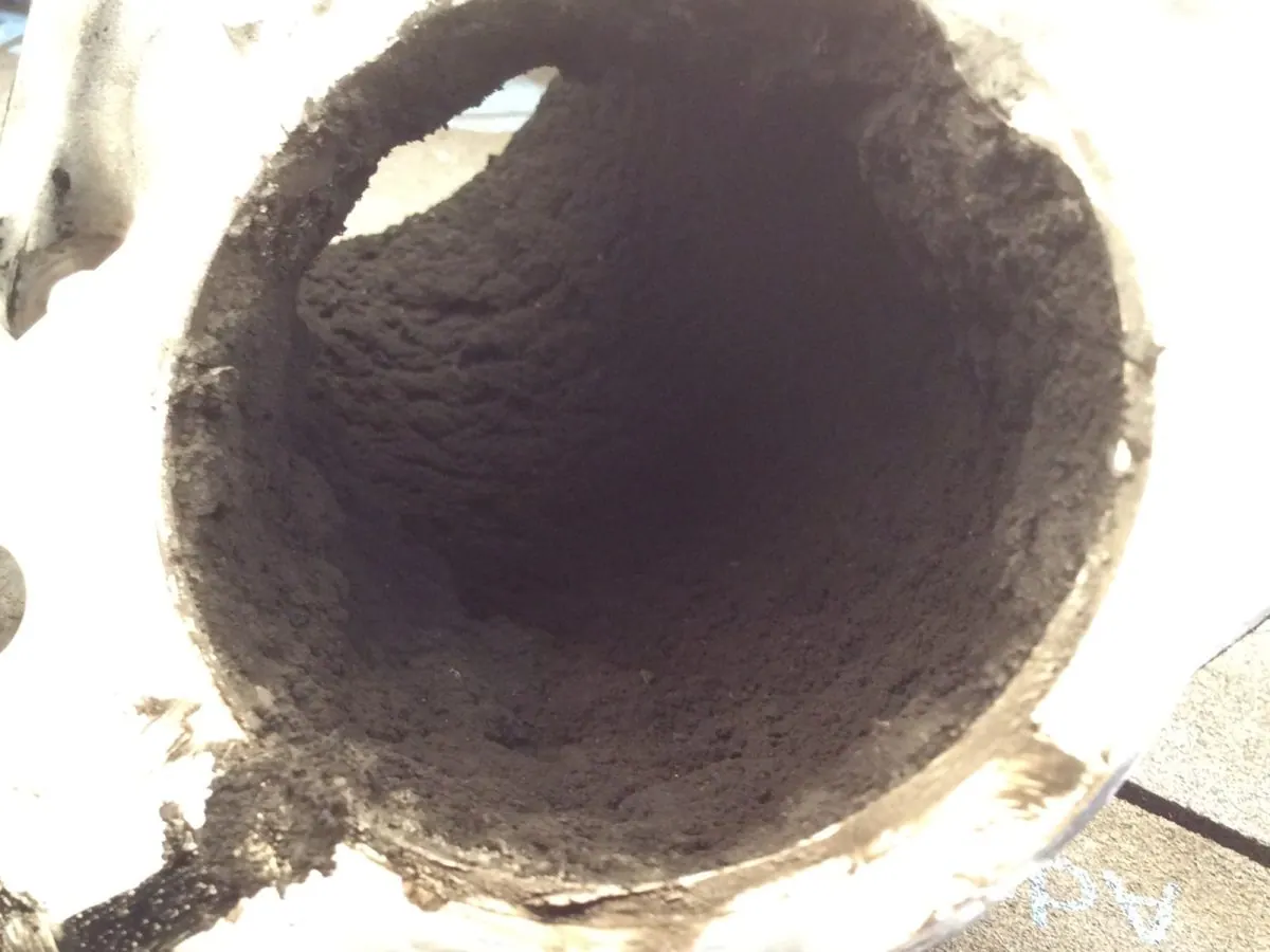 Diesel intake manifold bore bridged with hard carbon