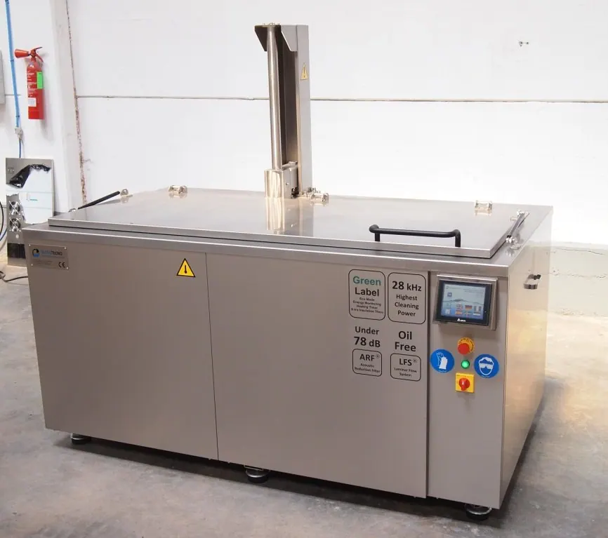 UltraTecno ACM ultrasonic cleaning machine installed on a workshop floor