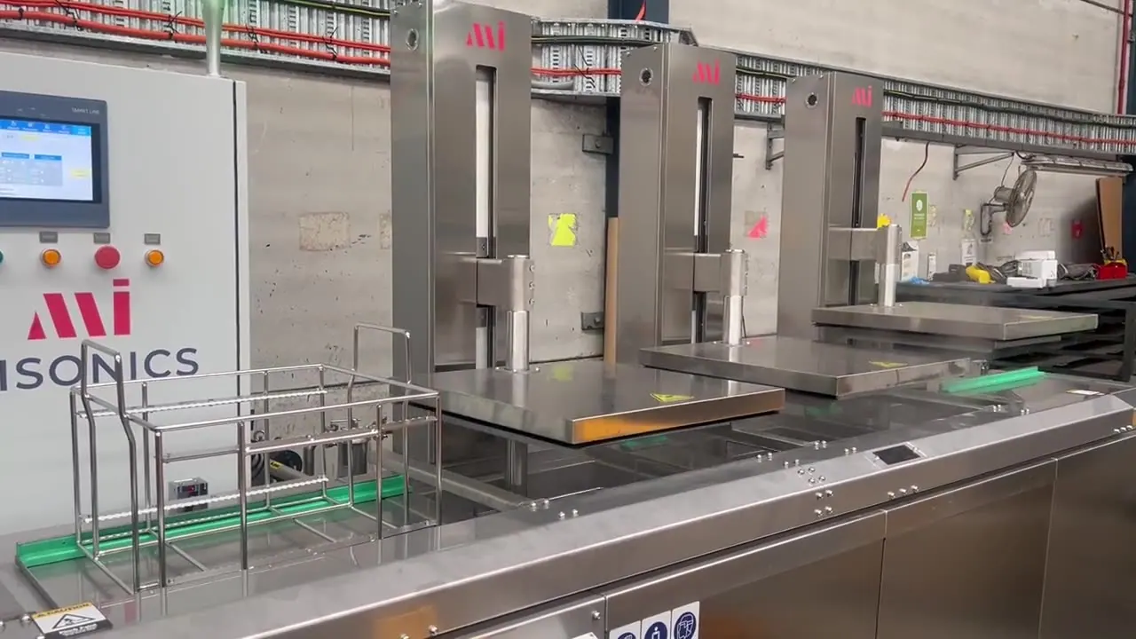 SonoLine multi-tank line with powered basket transfer, running